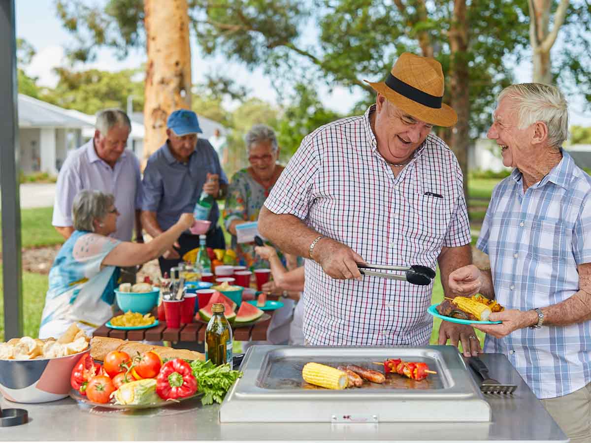 Resident having BBQ with family