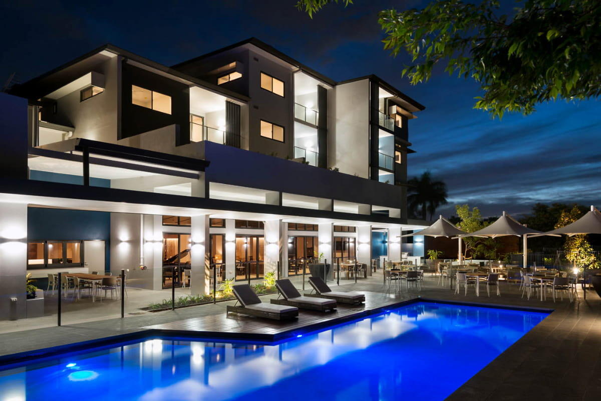 Robertson Park Retirement Village outdoor swimming pool and community centre at night