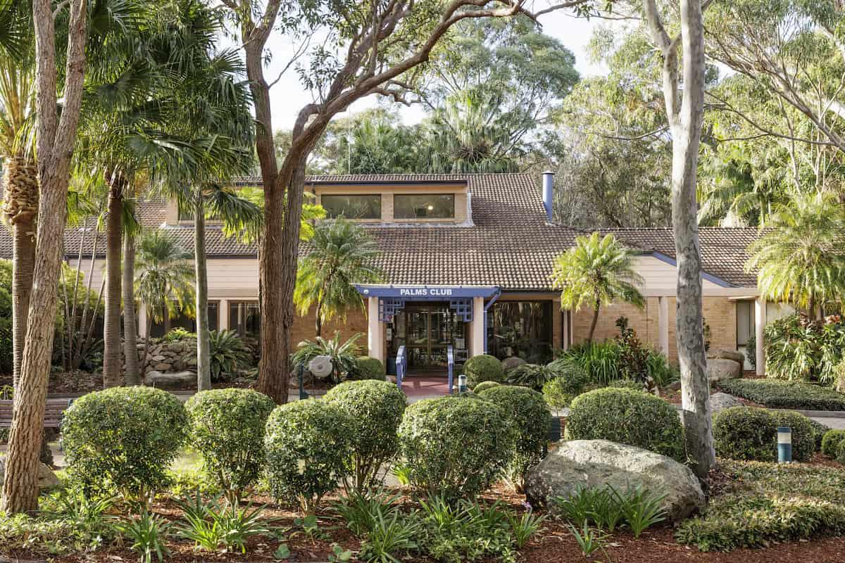 Image of Pittwater Palms Retirement Village Palms Club Community Centre Exterior and Surrounding Gardens